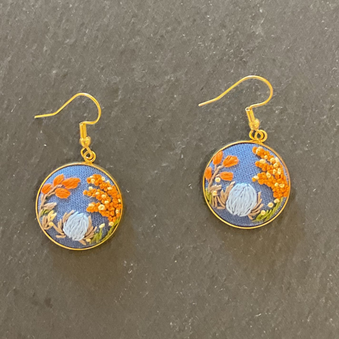 Round embroidered earrings