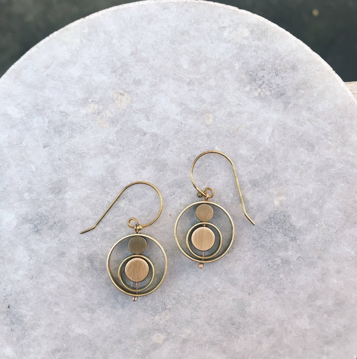 Kinetic circle earrings
