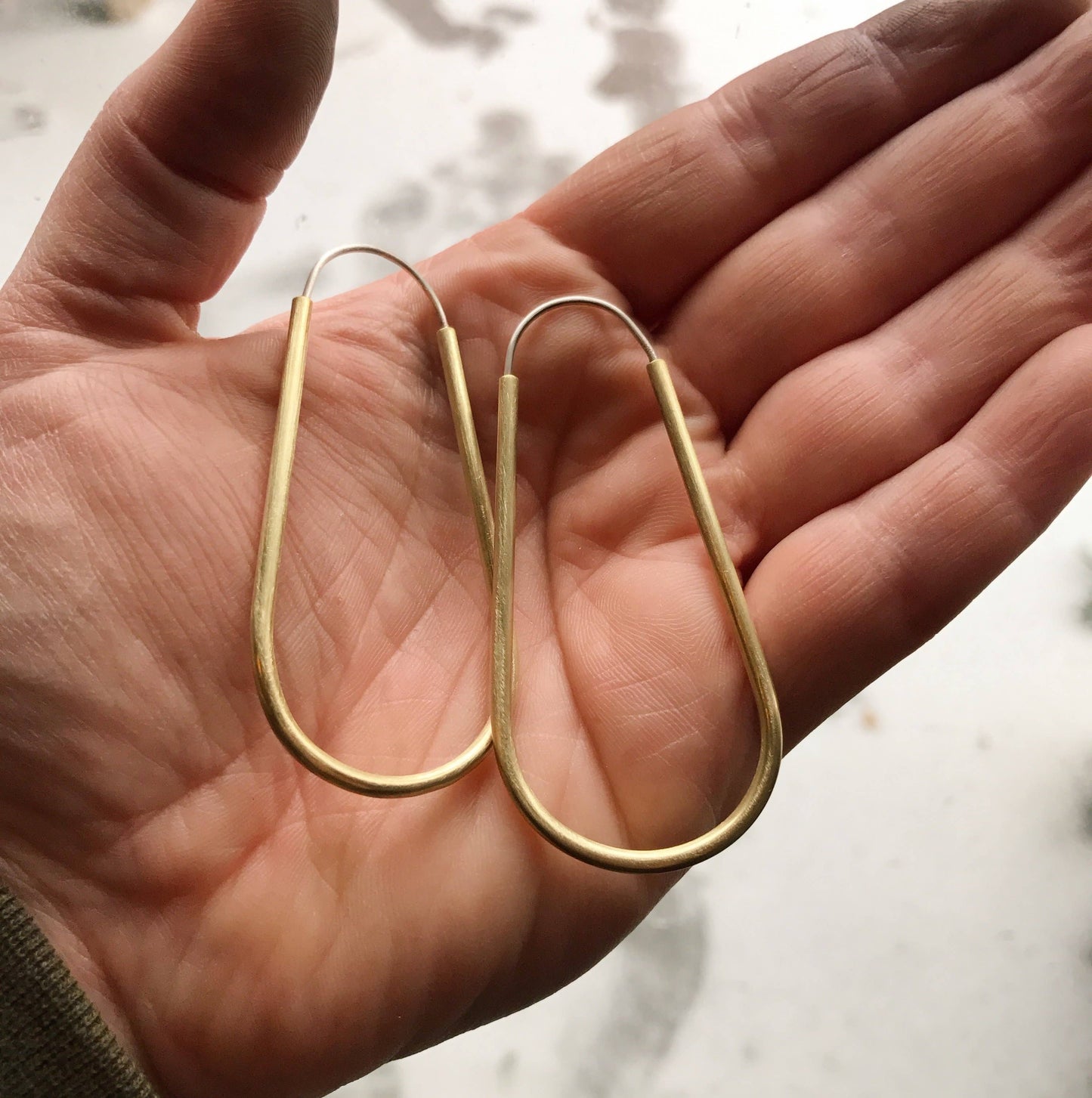 Long hollow brass hoops