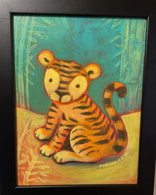 Sitting baby tiger