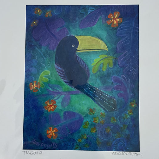 Colorful bird painting in a white frame on a wooden surface