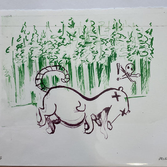 Hand-drawn illustration of a cat and bird on a piece of paper, placed on a wooden surface.