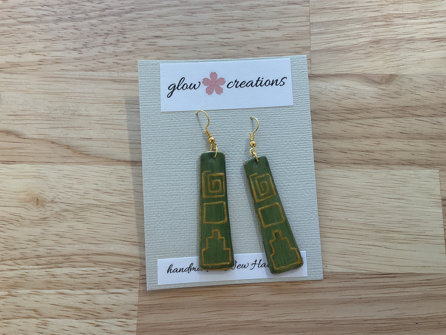 Green and gold square design