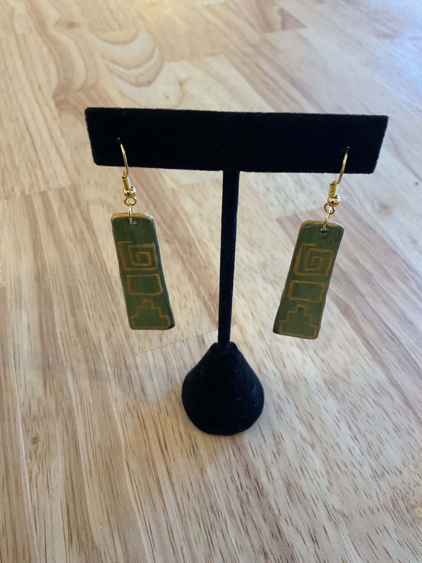 Green and gold square design