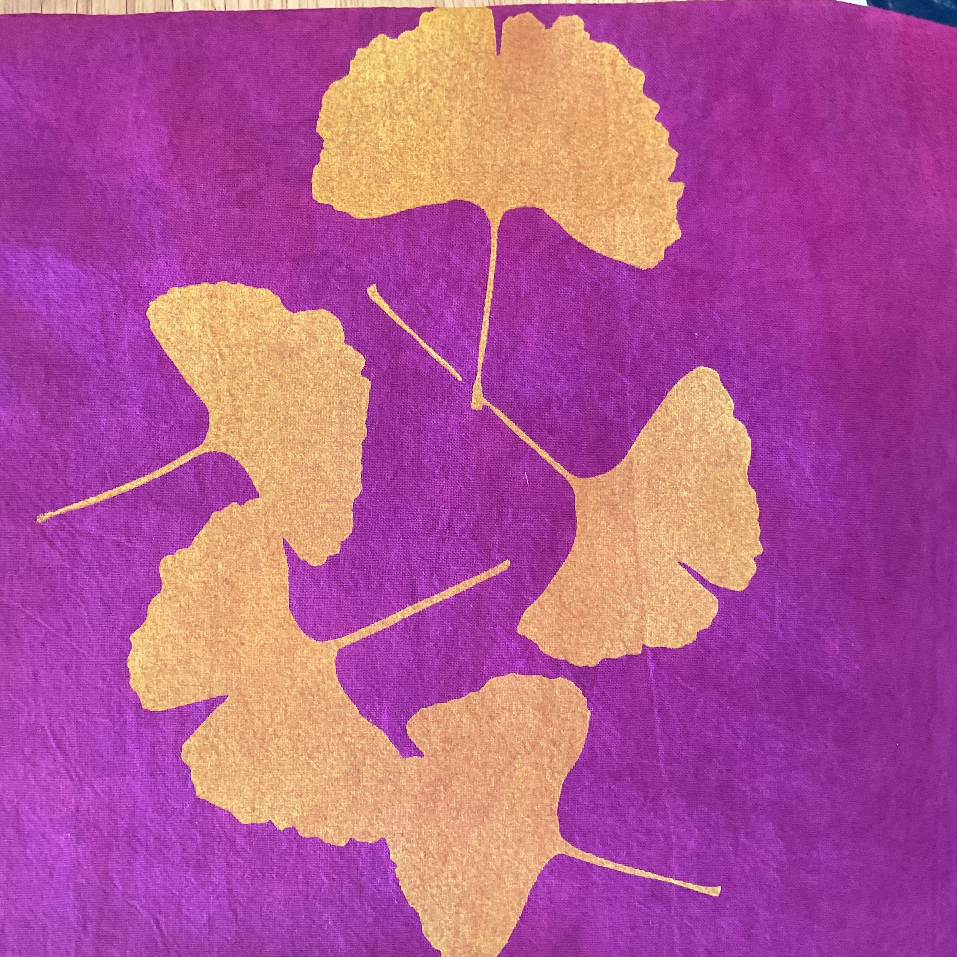 Purple fabric with gold leaf patterns