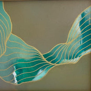 Framed artwork with teal and gold abstract design on a gray background