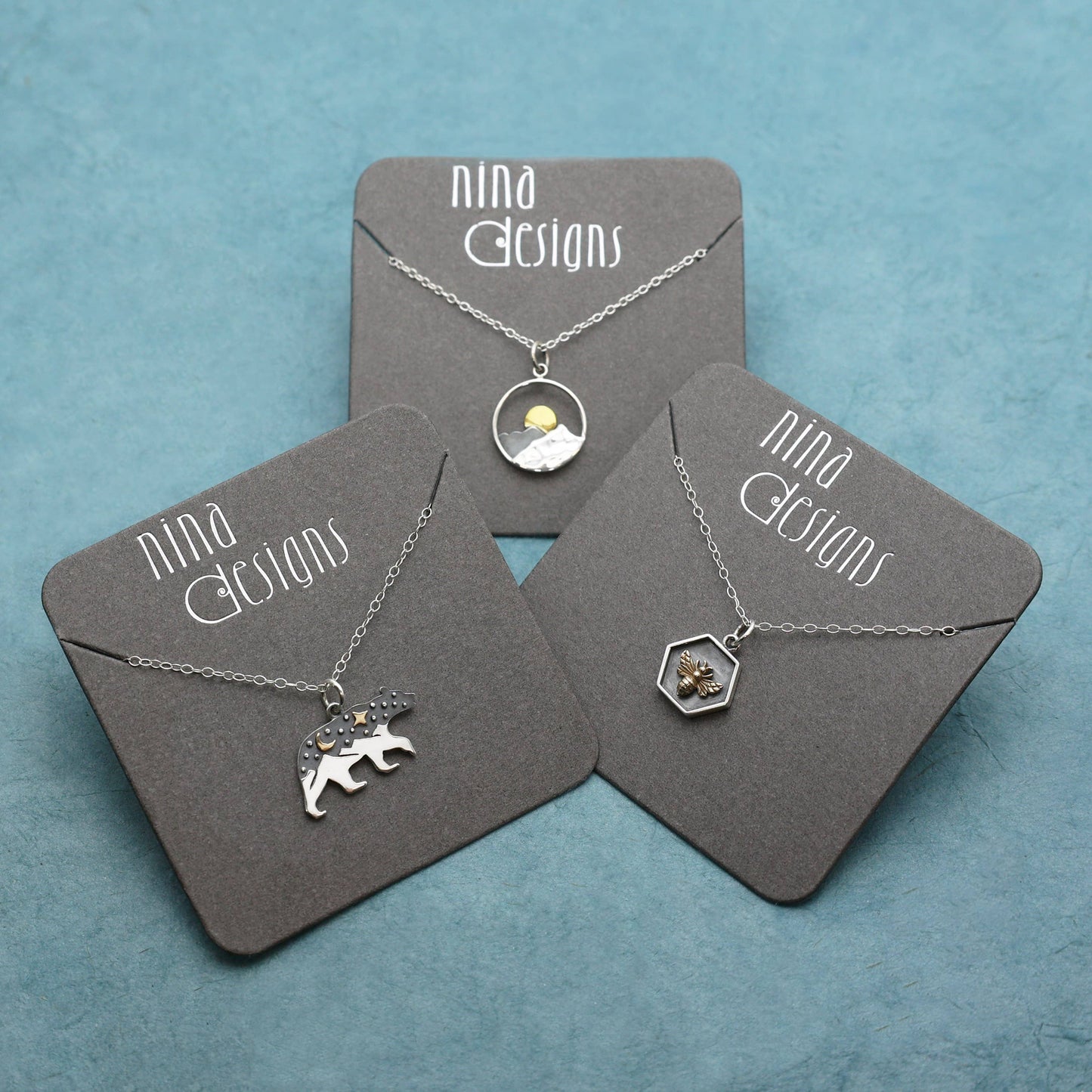 Sterling Silver Mountain Necklace with Bronze Sun